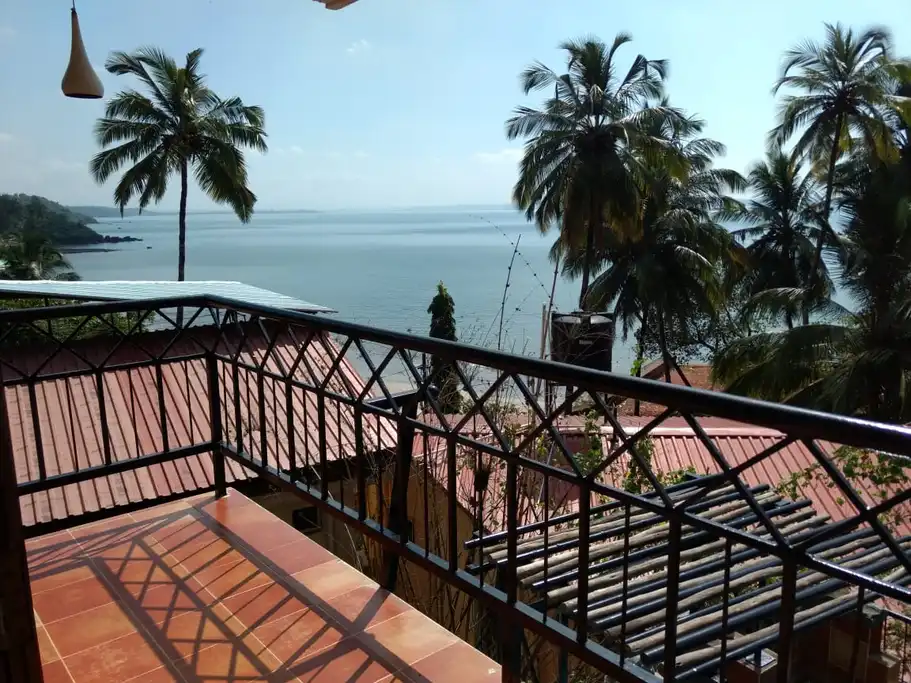 a balcony overlooking a body of water