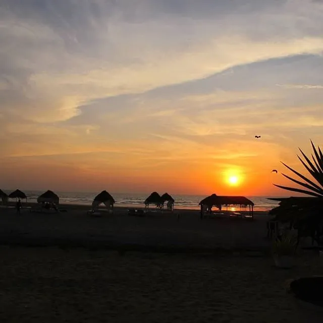 a sunset over a beach